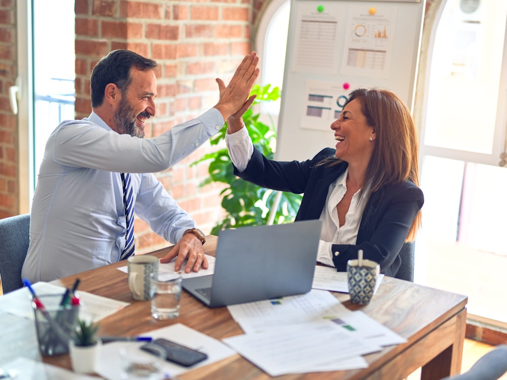 A hiring team reviewing candidates together